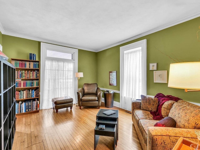 611 S Lynn St, Champaign, IL 61820 - living room with wood-type flooring and crown molding