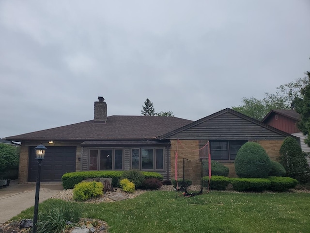 3771 Emerald Ave, Steger, IL 60475 - ranch-style house with a chimney, a garage, brick siding, driveway, and a front lawn