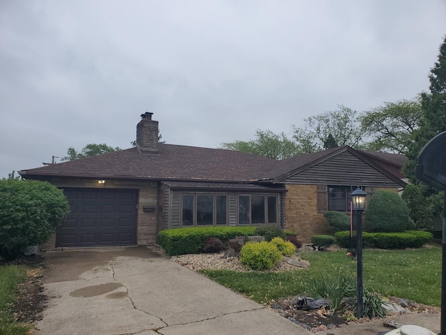 3771 Emerald Ave, Steger, IL 60475 - single story home featuring a chimney, driveway, an attached garage, and brick siding