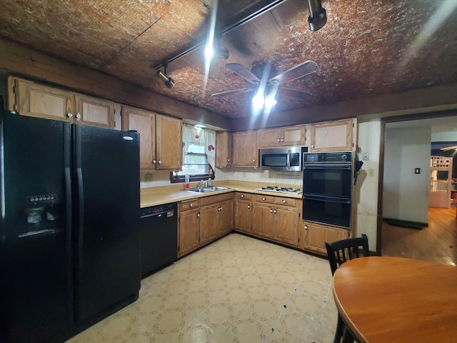 3771 Emerald Ave, Steger, IL 60475 - kitchen featuring black appliances, a sink, light flooring, a ceiling fan, and light countertops