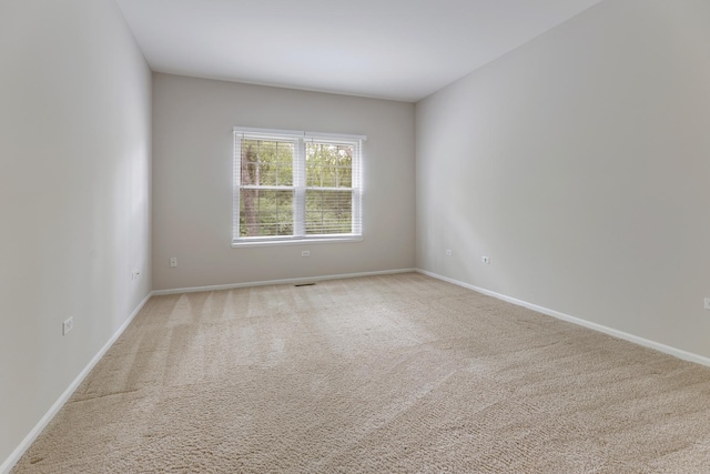 5261 Pebble Ln, Crystal Lake, IL 60012 - empty room with light carpet and baseboards