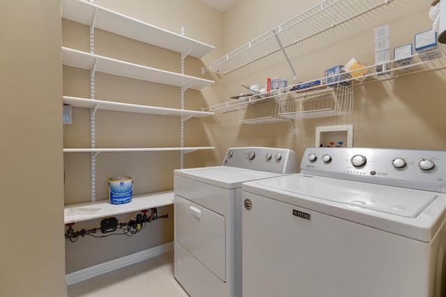 5261 Pebble Ln, Crystal Lake, IL 60012 - laundry area featuring washer and dryer and baseboards