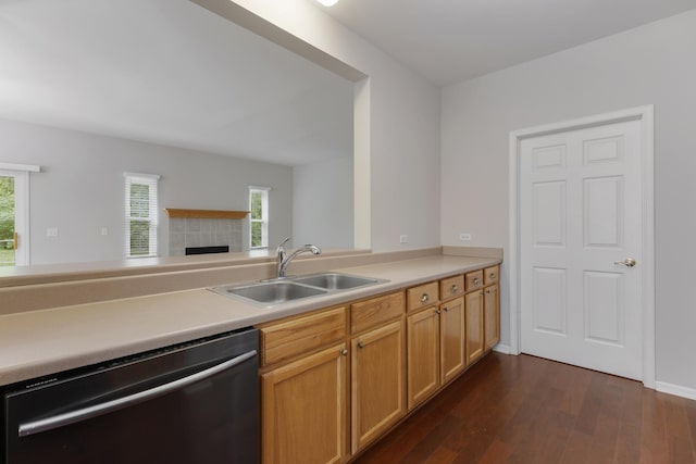 5261 Pebble Ln, Crystal Lake, IL 60012 - kitchen featuring dishwasher, a sink, light countertops, dark wood-style flooring, and healthy amount of natural light