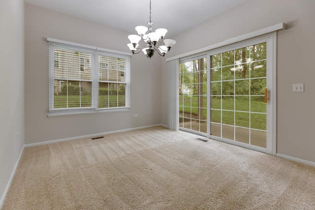 5261 Pebble Ln, Crystal Lake, IL 60012 - spare room with a chandelier, carpet flooring, and baseboards