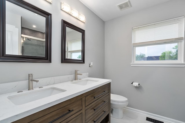 24723 W Champion Dr, Plainfield, IL 60585 - bathroom featuring double vanity, toilet, baseboards, a shower with shower door, and marble look tile flooring