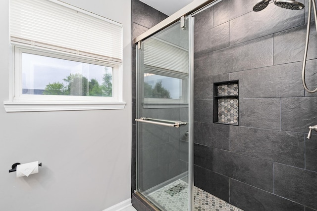 24723 W Champion Dr, Plainfield, IL 60585 - bathroom with a shower stall and baseboards