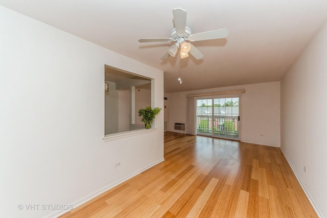 1220 Depot St Unit 411, Glenview, IL 60025 - unfurnished room featuring light wood finished floors, baseboards, and a ceiling fan