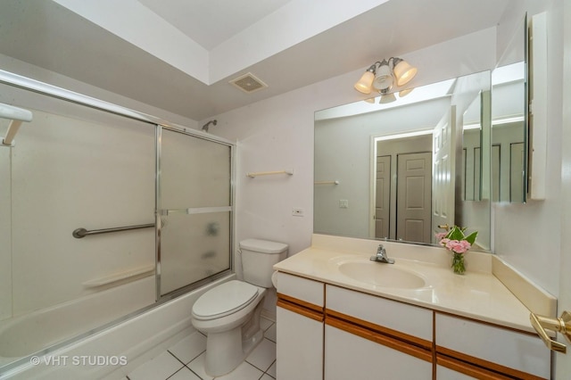 1220 Depot St Unit 411, Glenview, IL 60025 - bathroom with vanity, tile patterned floors, toilet, and enclosed tub / shower combo
