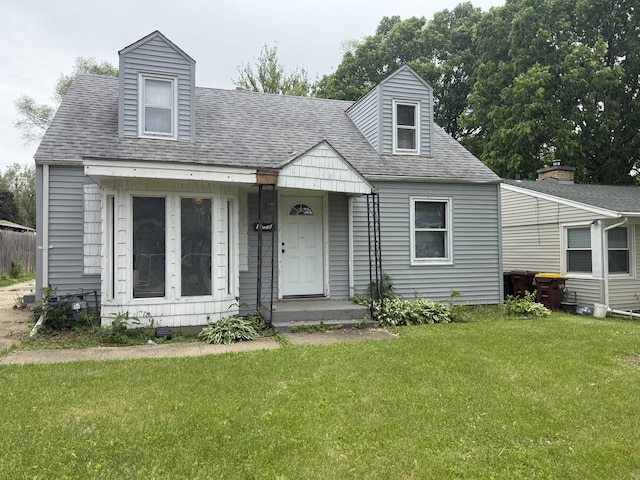 1908 Loomis St, Rockford, IL 61102 - cape cod house with a front yard and roof with shingles