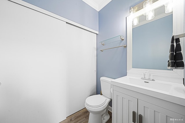1754 Fieldstone Dr N, Shorewood, IL 60404 - bathroom with crown molding, toilet, vanity, and wood finished floors