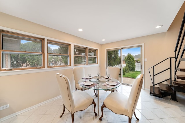 4945 N Neva Ave, Chicago, IL 60656 - dining room with baseboards, light tile patterned floors, and recessed lighting