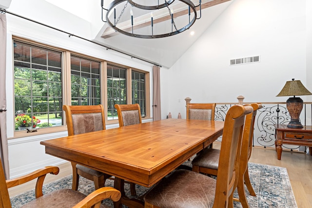 14240 W Forest Dr, Lake Forest, IL 60045 - dining space with light wood-style flooring, high vaulted ceiling, and recessed lighting