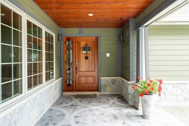 14240 W Forest Dr, Lake Forest, IL 60045 - view of exterior entry featuring a porch and stone siding