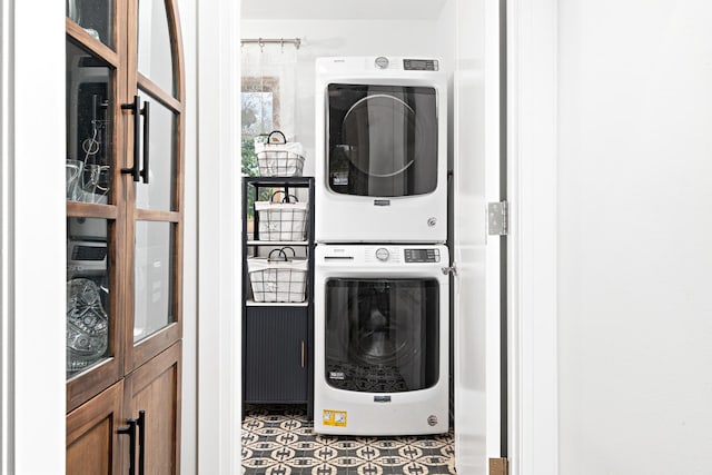 14240 W Forest Dr, Lake Forest, IL 60045 - laundry area featuring stacked washer and clothes dryer