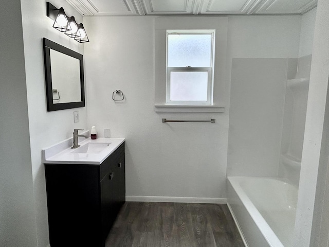 105 W 2nd St, Spring Valley, IL 61362 - full bath featuring wood finished floors, vanity, and baseboards