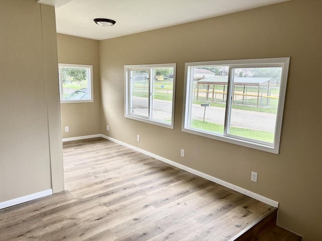 105 W 2nd St, Spring Valley, IL 61362 - empty room featuring baseboards and light wood-style floors