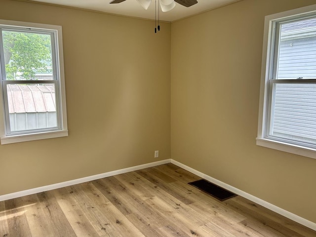 105 W 2nd St, Spring Valley, IL 61362 - empty room featuring ceiling fan, baseboards, and light wood-style floors