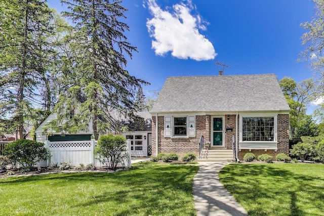 266 S Warrington Rd, Des Plaines, IL 60016 - view of front of house with brick siding and a shingled roof