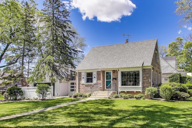 266 S Warrington Rd, Des Plaines, IL 60016 - new england style home featuring brick siding, a shingled roof, and a chimney