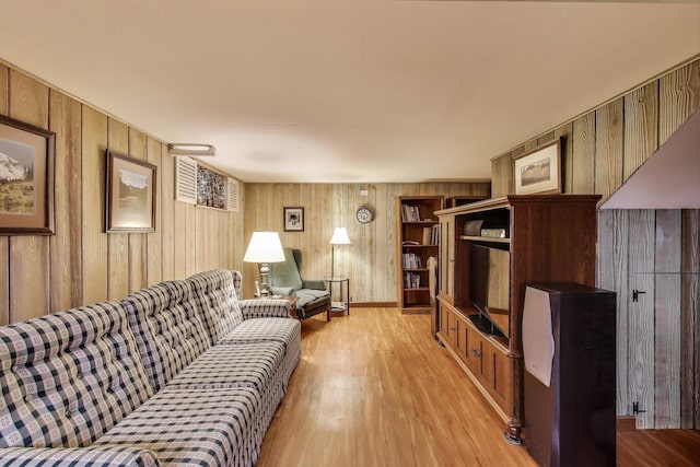 266 S Warrington Rd, Des Plaines, IL 60016 - living room featuring light wood finished floors and wooden walls