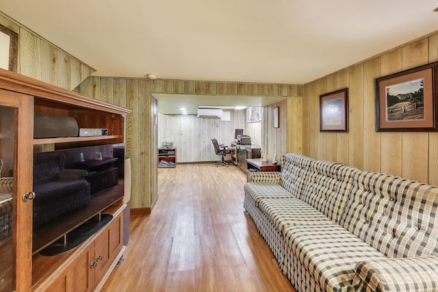 266 S Warrington Rd, Des Plaines, IL 60016 - living room featuring a wall unit AC, light wood finished floors, and wood walls
