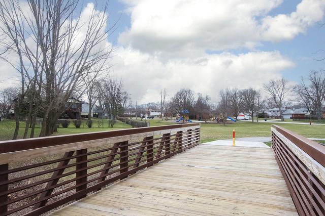 266 S Warrington Rd, Des Plaines, IL 60016 - deck with a yard and a residential view