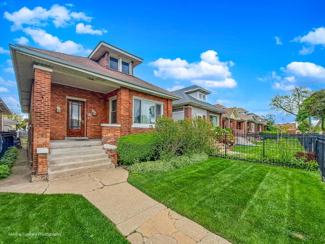 1508 N Massasoit Ave, Chicago, IL 60651 - bungalow-style home featuring brick siding and covered porch