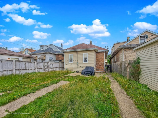 1508 N Massasoit Ave, Chicago, IL 60651 - rear view of property with a fenced backyard