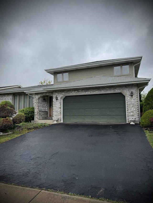 3006 Hawthorne Ln, Hazel Crest, IL 60429 - view of front of house with asphalt driveway and an attached garage