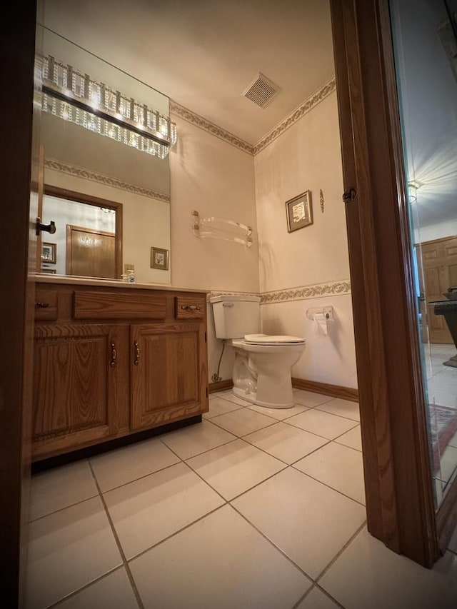 3006 Hawthorne Ln, Hazel Crest, IL 60429 - bathroom with tile patterned flooring, toilet, and vanity