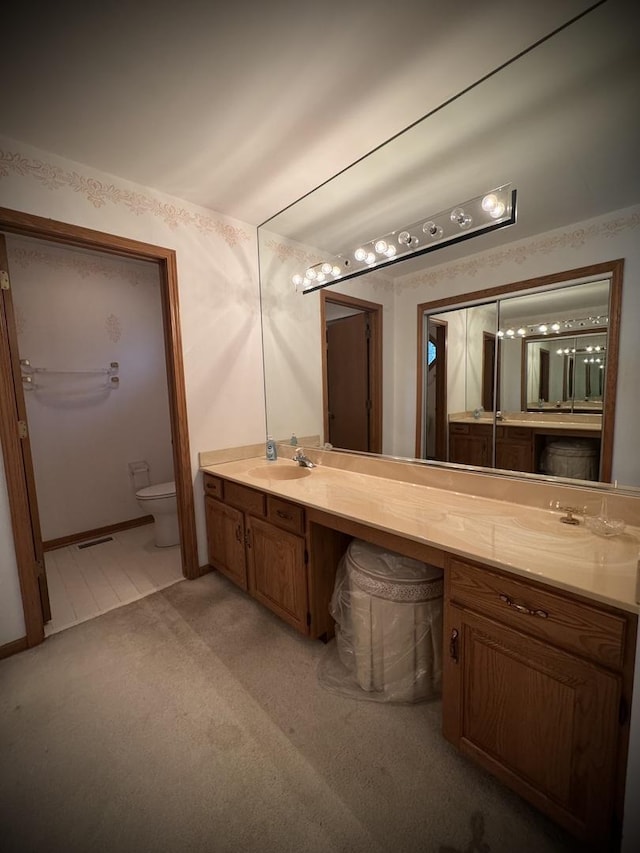 3006 Hawthorne Ln, Hazel Crest, IL 60429 - bathroom with vanity, toilet, and carpet floors