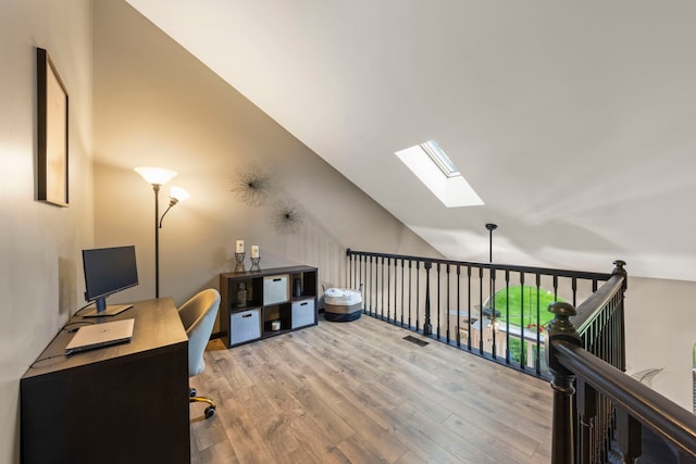 1322 Coldspring Rd, Carol Stream, IL 60188 - office featuring a skylight, vaulted ceiling, and wood finished floors