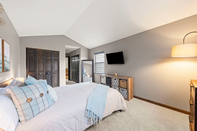 1322 Coldspring Rd, Carol Stream, IL 60188 - bedroom with carpet flooring, vaulted ceiling, baseboards, and two closets