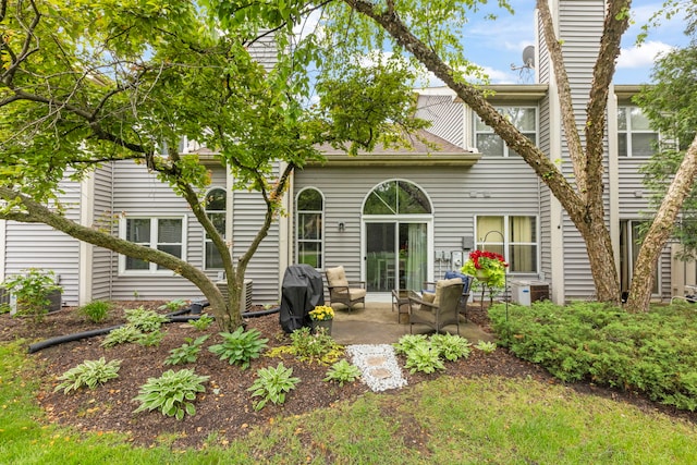 1322 Coldspring Rd, Carol Stream, IL 60188 - rear view of property with a patio area