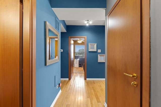 5054 N Troy St Unit 3, Chicago, IL 60625 - corridor with baseboards and light wood-type flooring