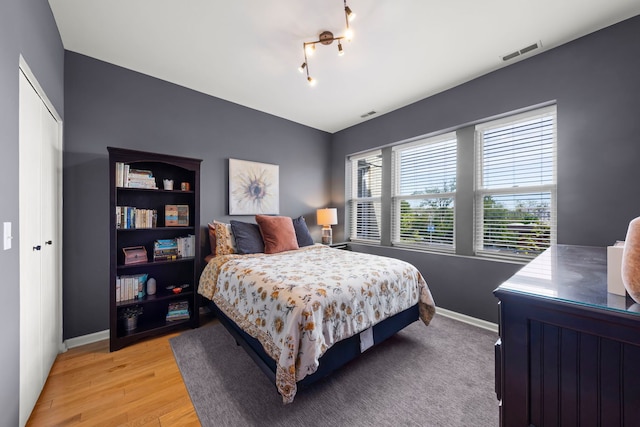 5054 N Troy St Unit 3, Chicago, IL 60625 - bedroom featuring baseboards and light wood-type flooring