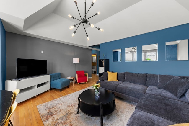 5054 N Troy St Unit 3, Chicago, IL 60625 - living area with a chandelier, hardwood / wood-style floors, and lofted ceiling