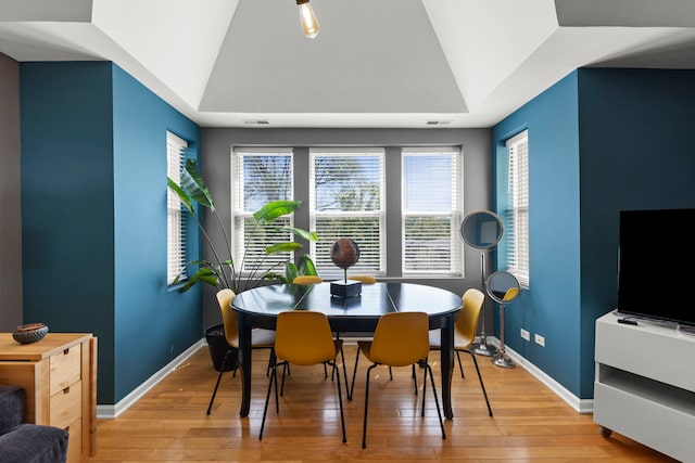 5054 N Troy St Unit 3, Chicago, IL 60625 - dining space featuring light wood-style floors, baseboards, and lofted ceiling