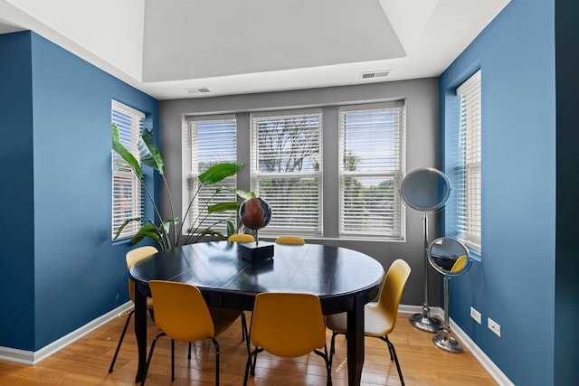 5054 N Troy St Unit 3, Chicago, IL 60625 - dining area featuring wood finished floors, baseboards, and a tray ceiling