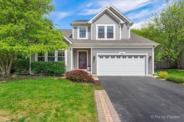 2552 Autumn Grove Ct, Aurora, IL 60504 - traditional-style house featuring asphalt driveway and a shingled roof