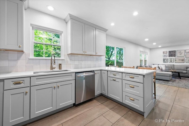 2552 Autumn Grove Ct, Aurora, IL 60504 - kitchen featuring dishwasher, a sink, gray cabinets, a peninsula, and recessed lighting