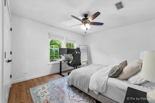 2552 Autumn Grove Ct, Aurora, IL 60504 - bedroom with wood finished floors, baseboards, and a ceiling fan