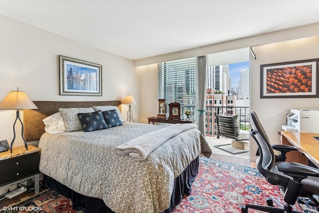 71 E Division St Unit 1606, Chicago, IL 60610 - bedroom featuring access to outside, a desk, and a view of city