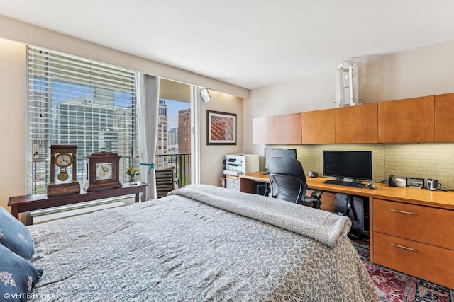 71 E Division St Unit 1606, Chicago, IL 60610 - bedroom featuring access to outside and a desk