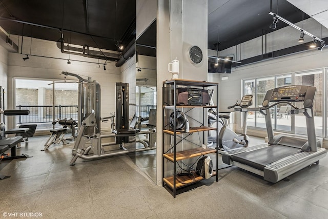 71 E Division St Unit 1606, Chicago, IL 60610 - gym featuring track lighting and a towering ceiling