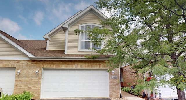 16158 Hillcrest Cir, Orland Park, IL 60467 - view of front of house featuring brick siding and a shingled roof