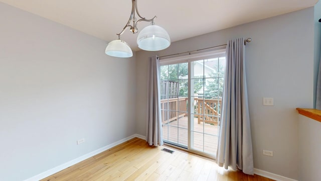 16158 Hillcrest Cir, Orland Park, IL 60467 - unfurnished room featuring light wood finished floors and baseboards