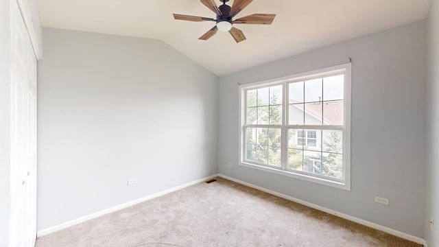 16158 Hillcrest Cir, Orland Park, IL 60467 - spare room with plenty of natural light, carpet flooring, lofted ceiling, and a ceiling fan