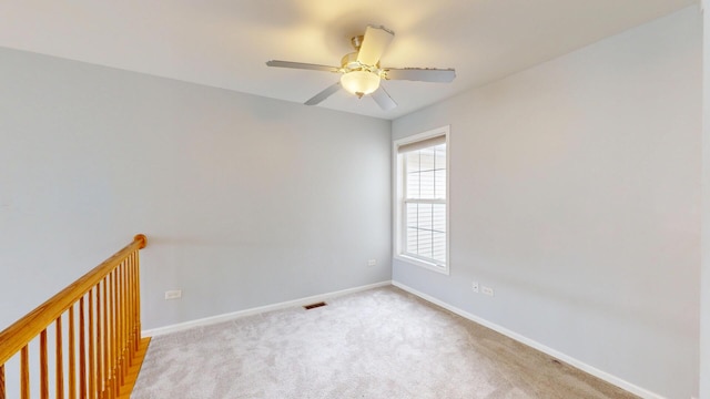 16158 Hillcrest Cir, Orland Park, IL 60467 - carpeted empty room with a ceiling fan and baseboards