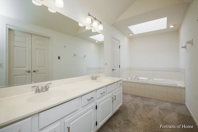 2755 Newport Dr, Naperville, IL 60565 - bathroom featuring a skylight, double vanity, a bath, and lofted ceiling